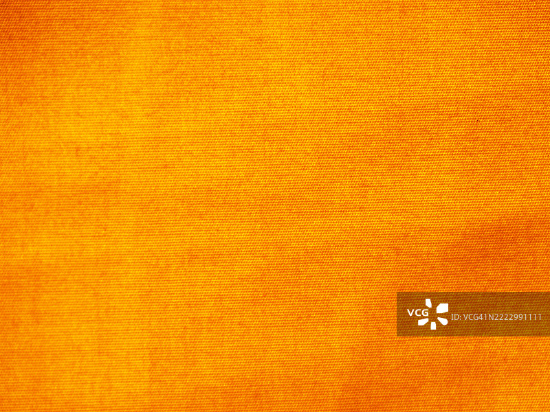 橙色棉布，干净而崭新。法国上萨瓦省埃维昂莱班。阳光。自然色彩。虚焦摄影。全画幅 4:3图片素材