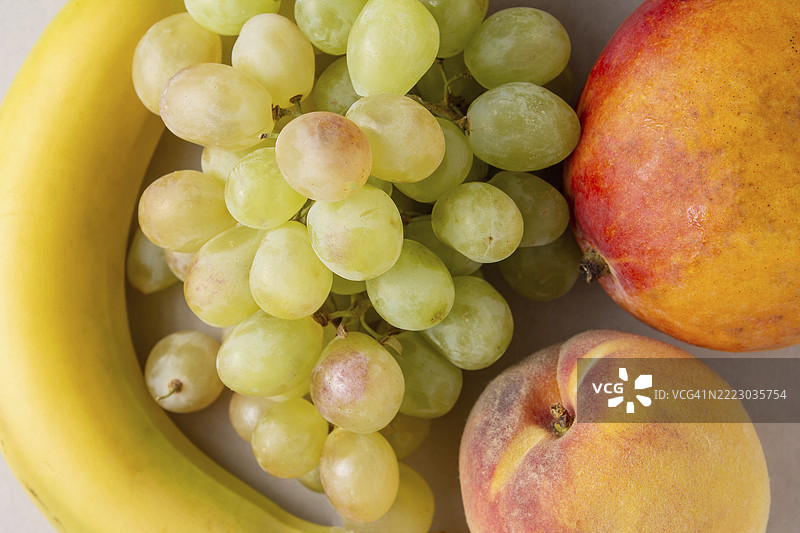 香蕉、葡萄、芒果、桃子的特写镜头图片素材