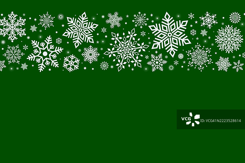 绿色背景上的白色雪花边框图片素材