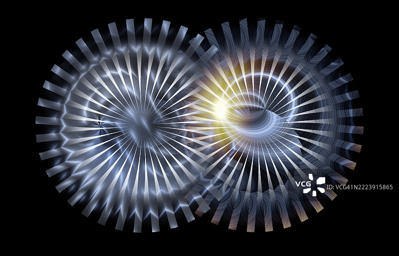 两个齿轮，齿轮在黑色背景上相互配合运动。图片素材