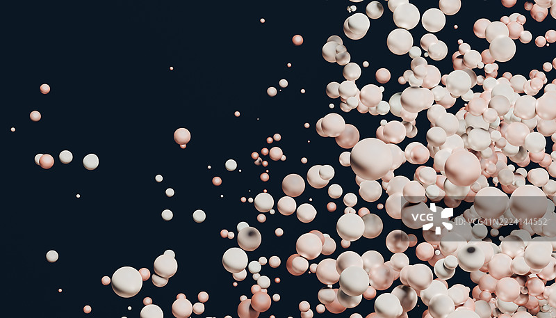 粉色和白色的球体漂浮在深蓝色背景上图片素材