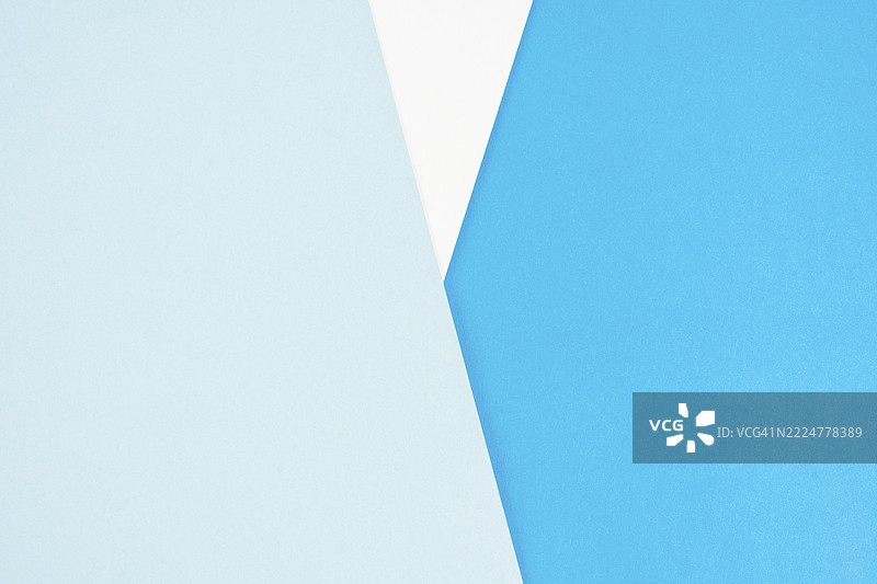 蓝色渐变纸纹理作为背景。图片素材