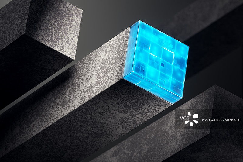 发光立方体照亮混凝土块，象征着创新图片素材