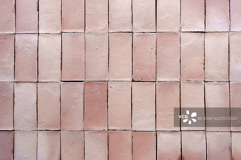 粉色矩形陶土砖形成美丽的图案图片素材
