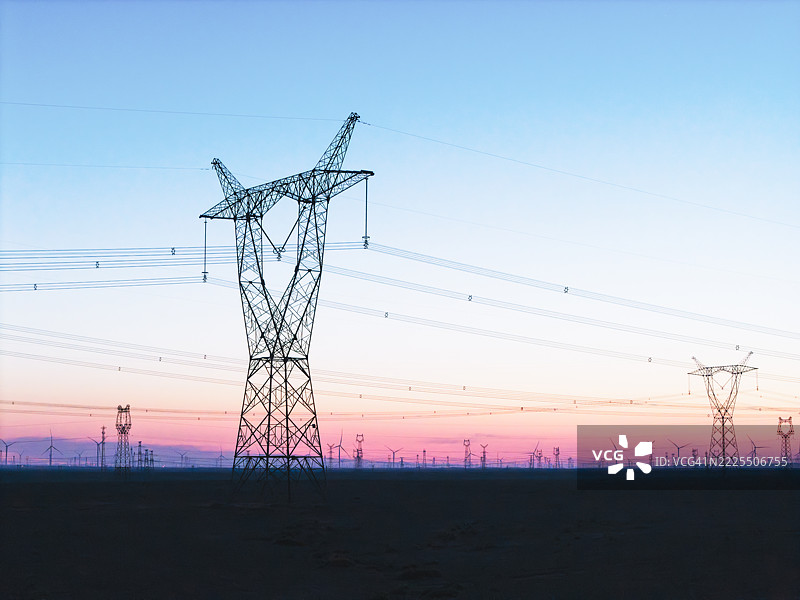 日出，电力传输网络图片素材