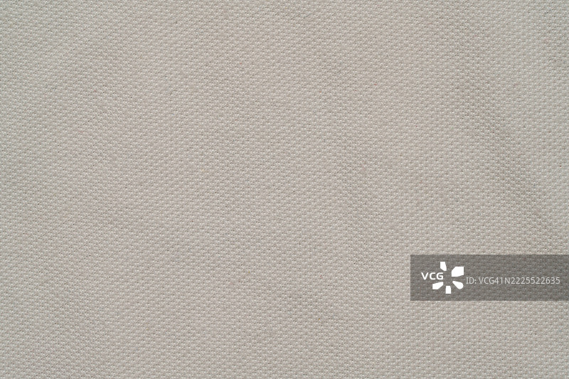 旧白色布料的特写。图片素材