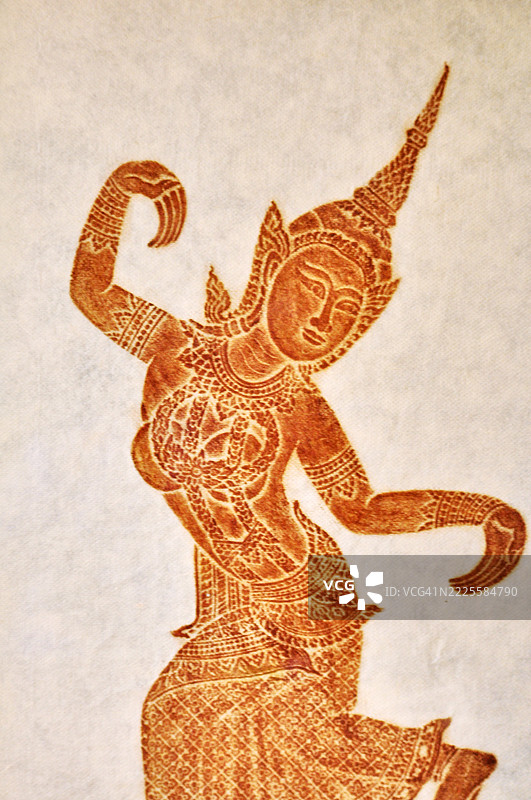 一幅传统泰国寺庙的拓印，印在浅色纸上。图片素材