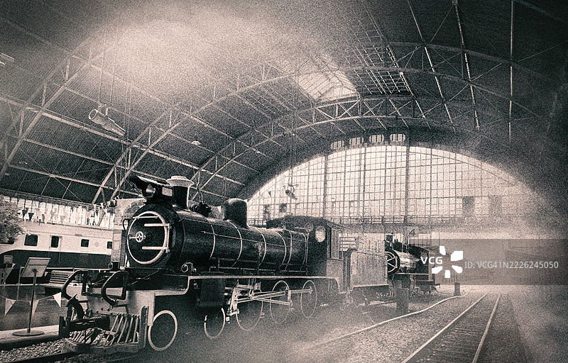 复古风格的老式蒸汽火车在火车站内图片素材