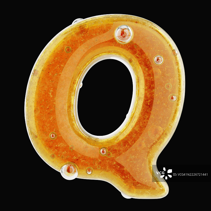 由流动的新鲜蜂蜜制成的字母Q特写。图片素材