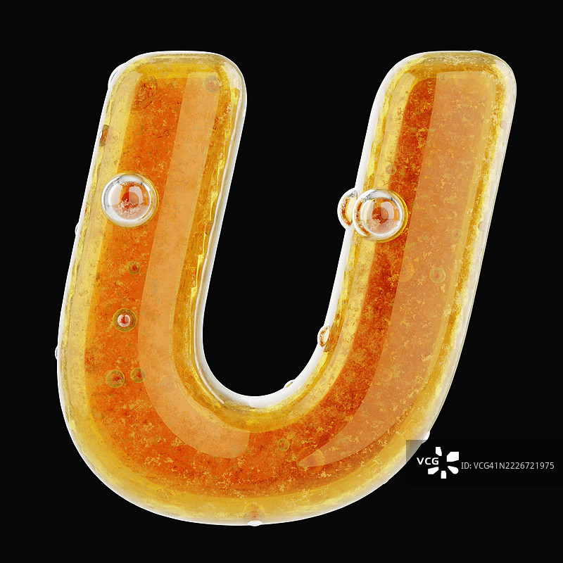 用流动的新鲜蜂蜜制成的字母U特写。图片素材