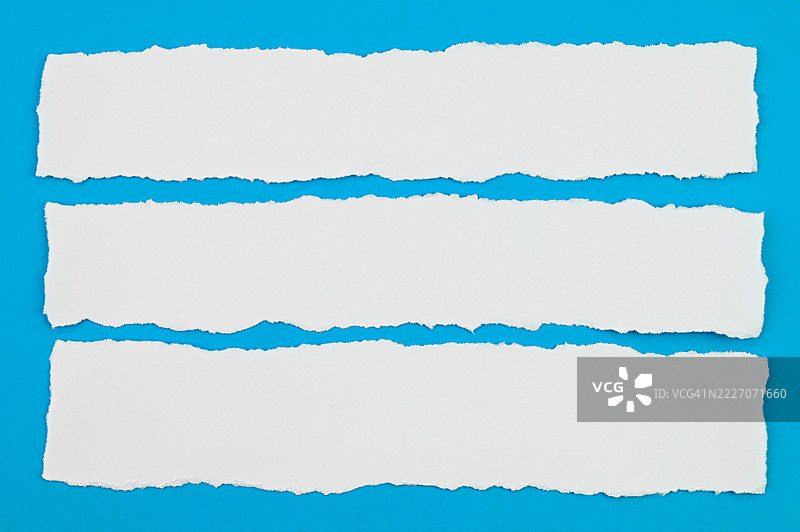 白色撕裂的纸张图片素材