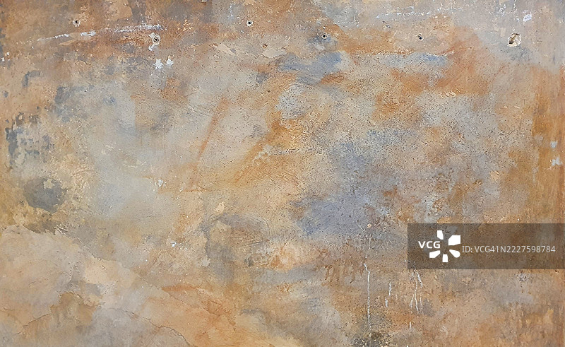 褪色混凝土墙的特写，展现不同的色调图片素材