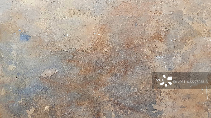 褪色混凝土墙的特写，展现不同的色调图片素材
