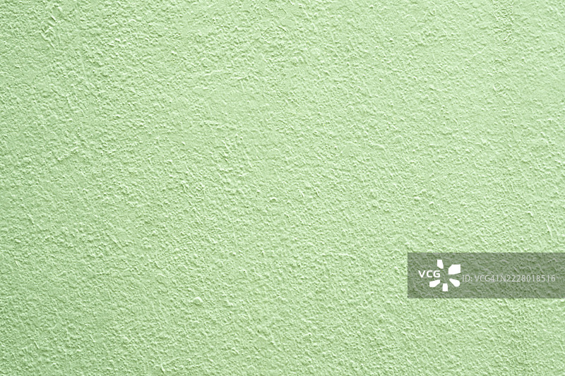 浅绿色墙面纹理抽象磨损背景。图片素材