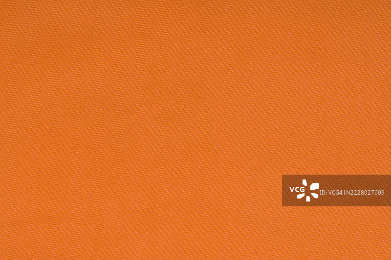 橙色运动服面料，足球衫的质地，纺织背景图片素材