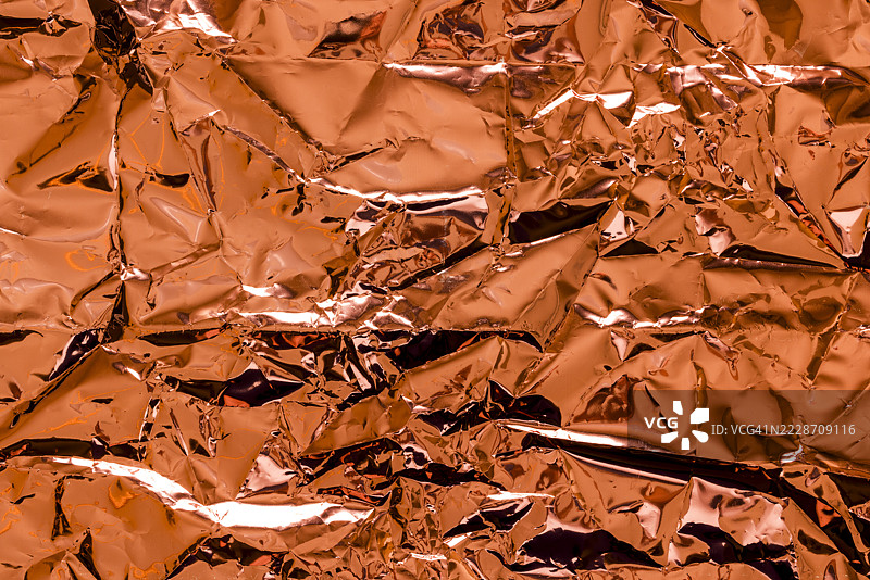 皱褶的红色光面纸背景图片素材