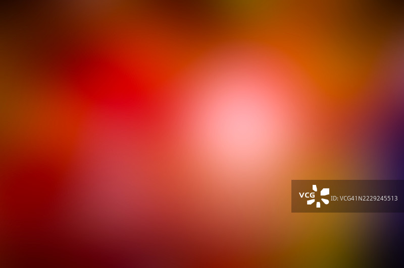 抽象模糊背景，红色、橙色、粉色、紫色。鲜艳的红色和紫色渐变模糊背景图片素材