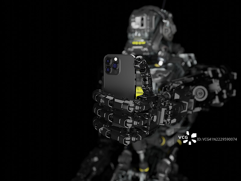机器人拿着智能手机图片素材