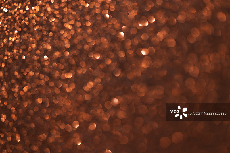 棕色闪亮的亮片散景灯光背景图片素材