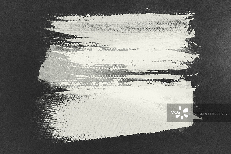 黑墙上的白色涂料磨损背景图片素材