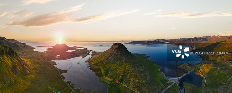 冰岛斯奈法尔斯半岛基尔基尤费尔山的日落剪影，壮观的空中无人机视角图片素材