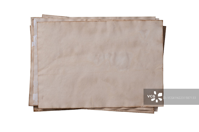 一堆旧棕色纸张孤立在白色背景上图片素材