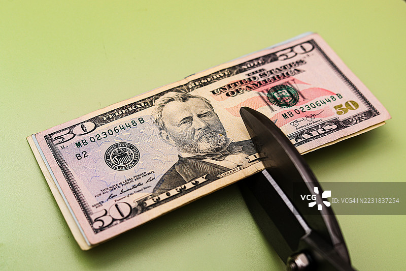 预算削减，费用削减；美元图片素材