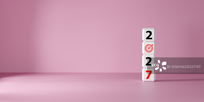 粉色背景上的带目标符号的编号积木堆叠图片素材