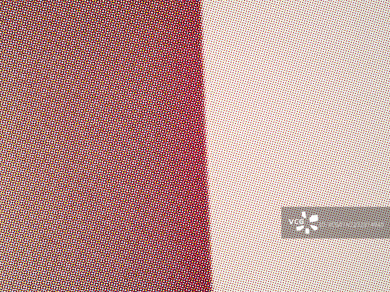 胶印海报的微距摄影：白纸上的红、蓝、黄、黑小点。4:3 格式。图片素材