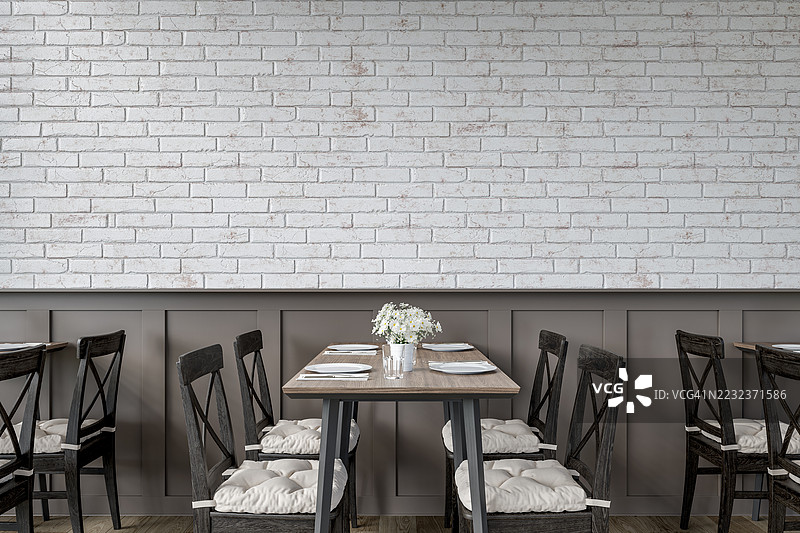 现代餐厅内部，前面是白色涂漆砖墙和棕色木质护墙板，配有餐桌和木椅，地面为硬木地板。图片素材