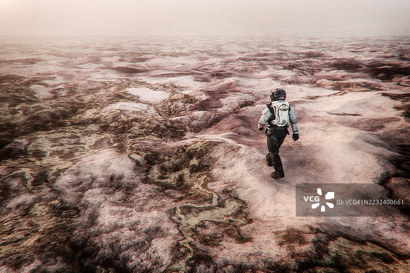宇航员在外星球表面行走图片素材