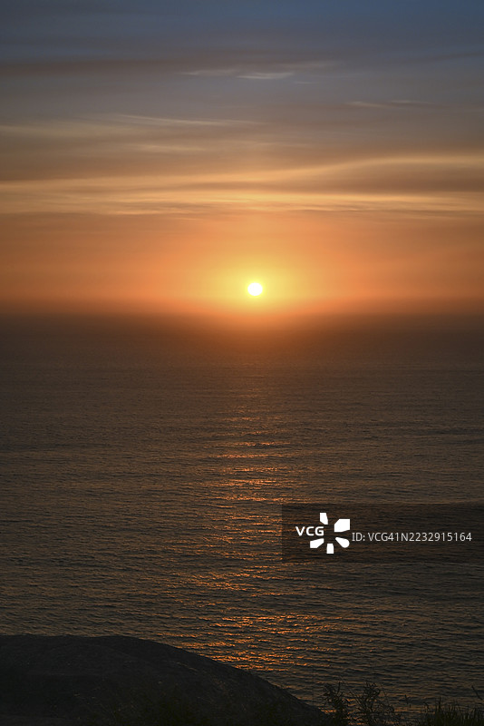 西班牙芬斯特雷角的亚特兰大洋日落图片素材