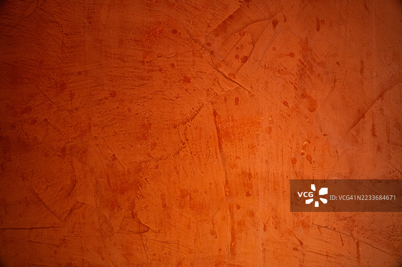橙色涂漆水泥墙的背景图片素材