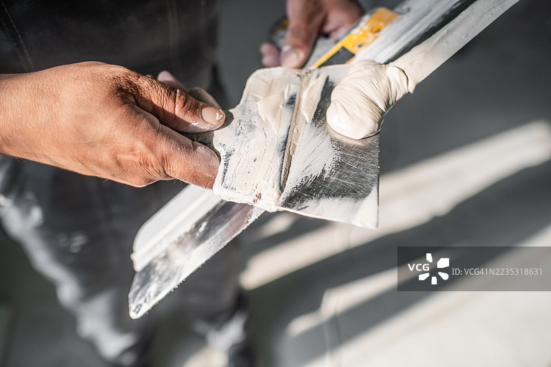 建筑工地上的抹灰工图片素材