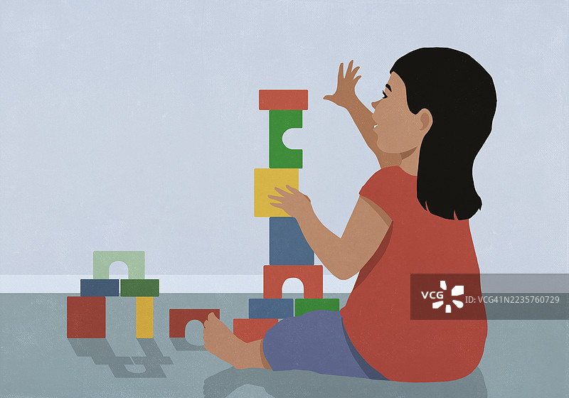 小女孩在地板上玩耍，堆叠玩具积木图片素材