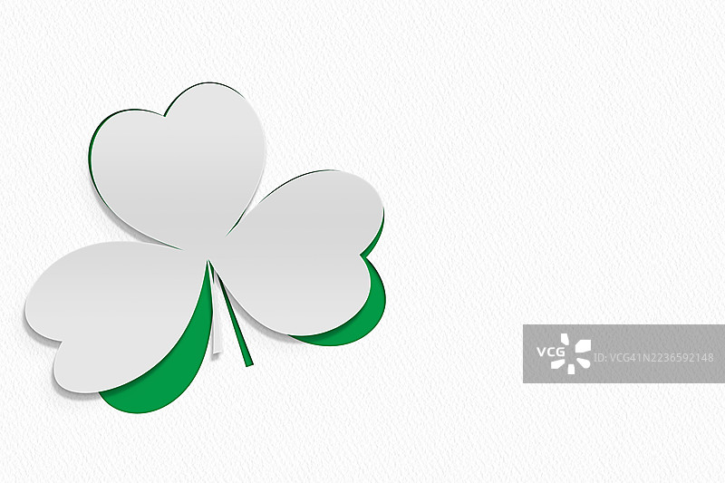 可爱的剪纸单一圣帕特里克节三叶草绿色，留有空间供您留言。图片素材