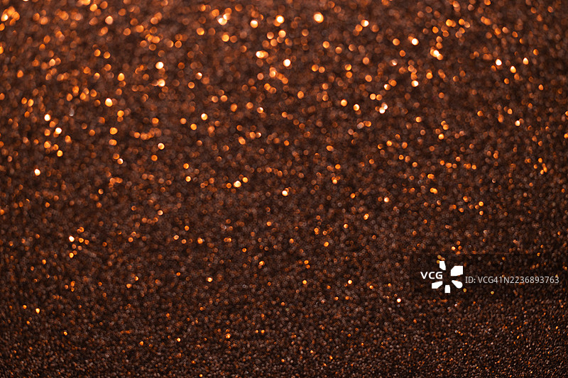 棕色闪亮的亮片虚化灯光背景图片素材