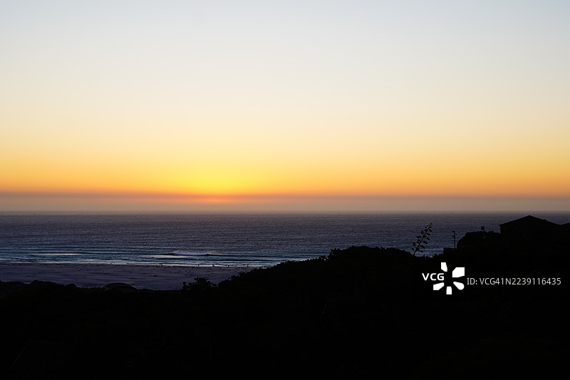 南非诺德胡克海滩的日落剪影图片素材