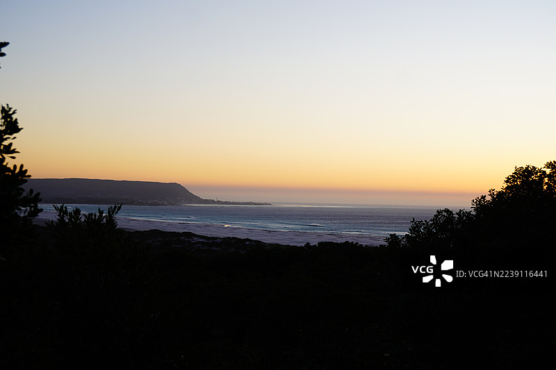 南非诺德胡克海滩日落，树木图片素材