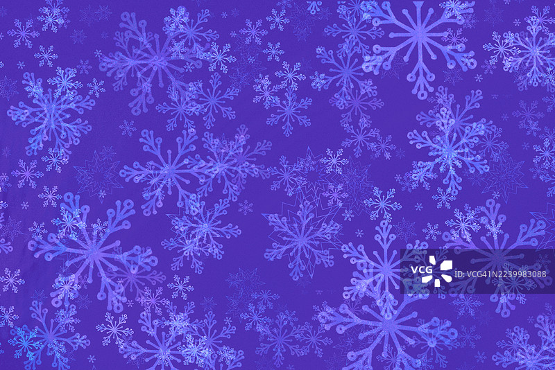 蓝雪花冬季雪花图案背景，适用于节日或季节性设计图片素材