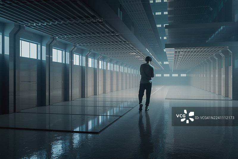 年轻男子在未来城市中边走边听音乐图片素材