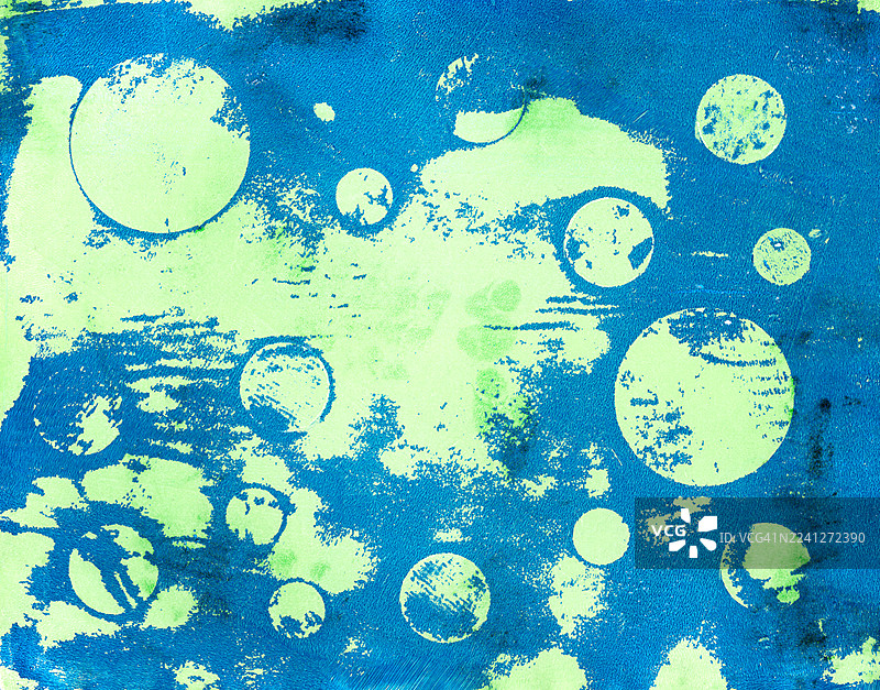 抽象的蓝色污渍艺术，带有类似行星和月亮的圆形图片素材