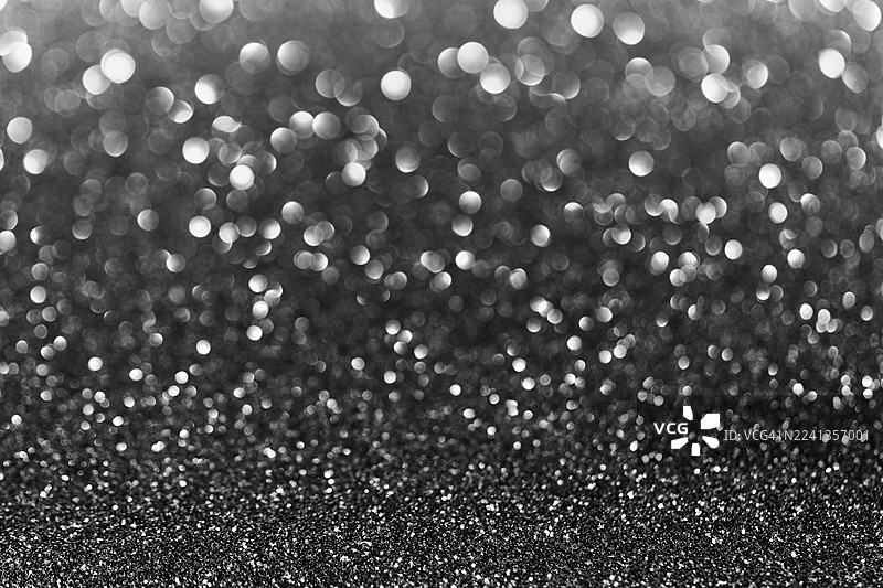 闪亮的黑白散景闪光纹理，适用于派对魅力或背景设计图片素材