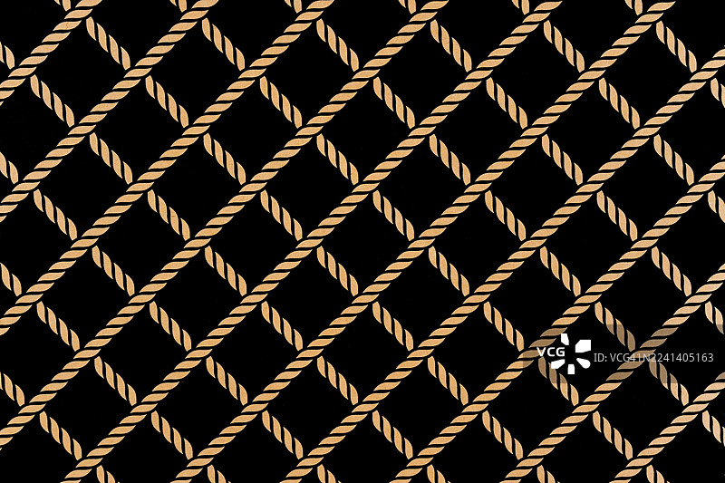 棕色线条和黑色纸张，以纹理作为背景。图片素材