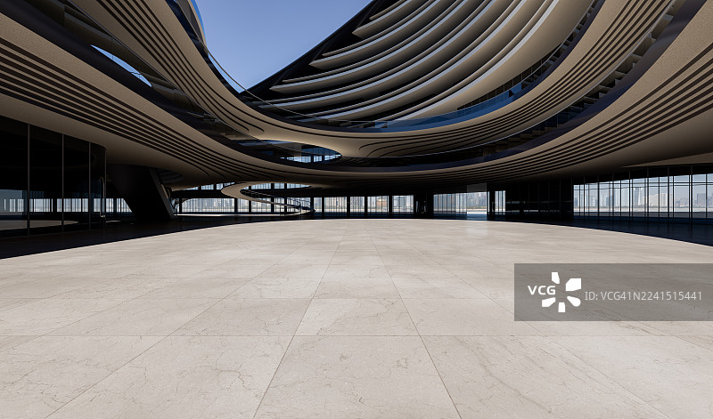 现代建筑室内中庭，具有多层曲线混凝土造型、旋转楼梯和宽大的玻璃幕墙。图片素材