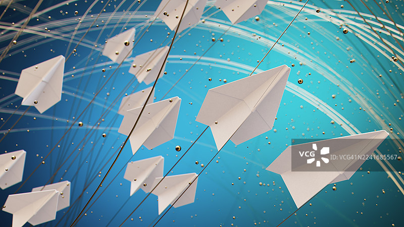 纸飞机在蓝天中翱翔，留下了白色轨迹和圆形光点图片素材