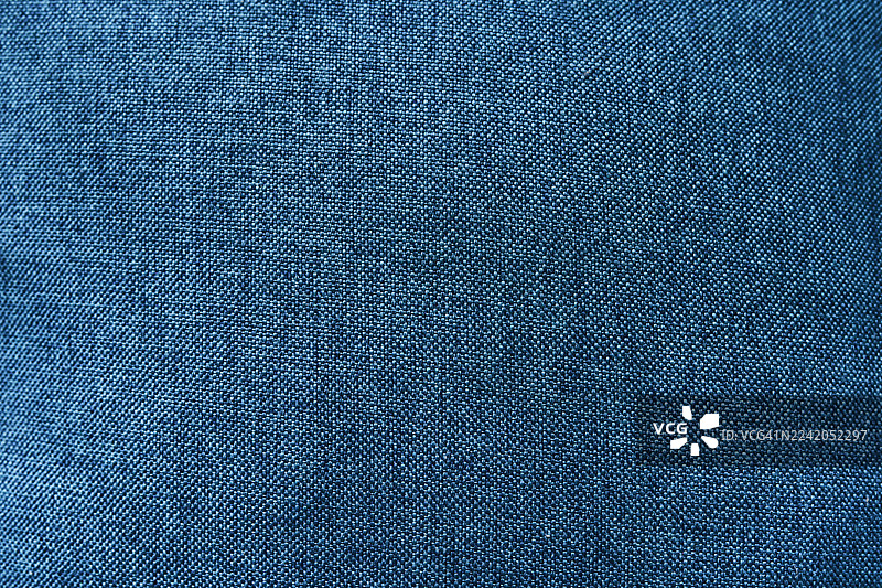 蓝色牛仔布纹理特写，用于背景、时尚或纺织项目图片素材