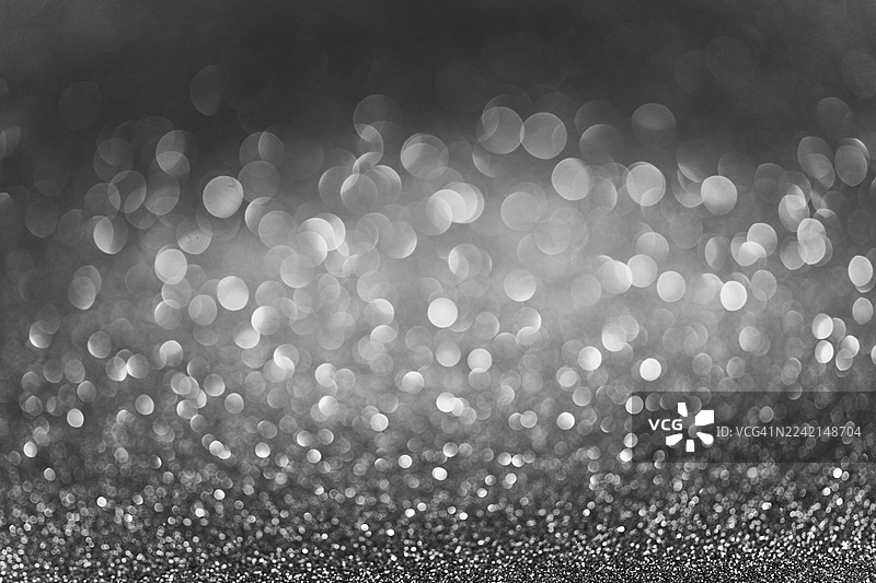 闪耀的黑白散景闪光纹理，适合派对魅力或图片素材