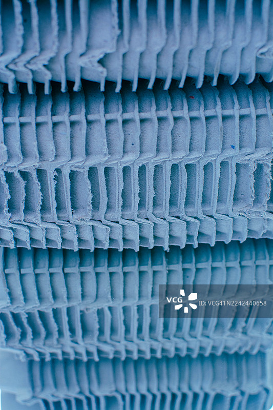 回收的纸板包装，形成抽象的纹理图案图片素材