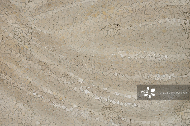 米色石材马赛克拼贴的抽象图案图片素材